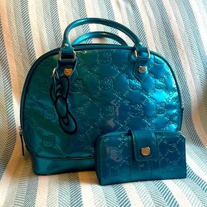 Adorable Sanrio Hello Kitty purse and matching wallet.